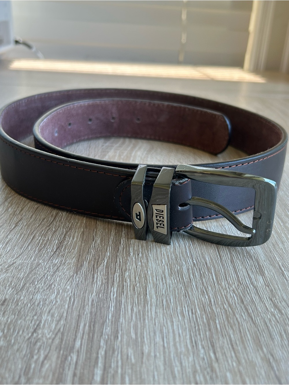 Diesel dark brown leather belt with maroon lining and gunmetal buckle